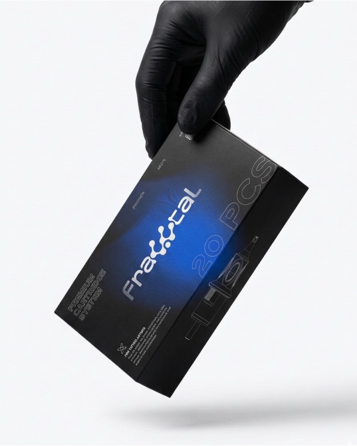 Packaging premium Fractal — caja negra con detalle azul